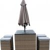 Six Piece Brown and Gray Faux Wicker Outdoor Bar Height Table Set with Umbrella and Stools