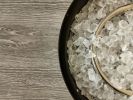 Round Black Metal and Tile Fire Pit with Glass Rocks